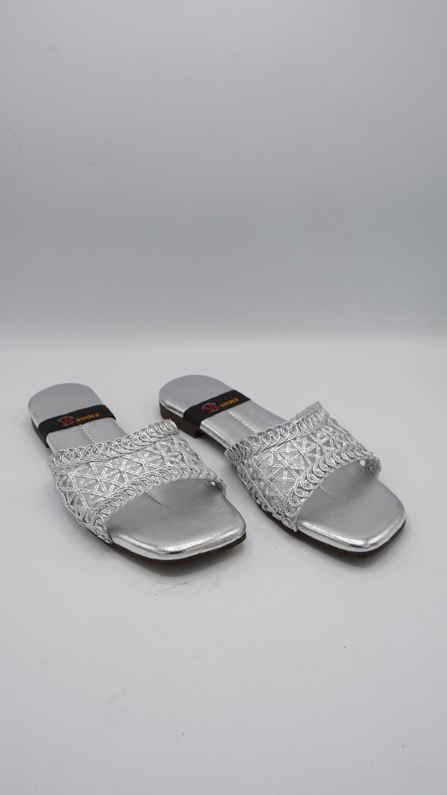 Radiant Silver Braided Slides