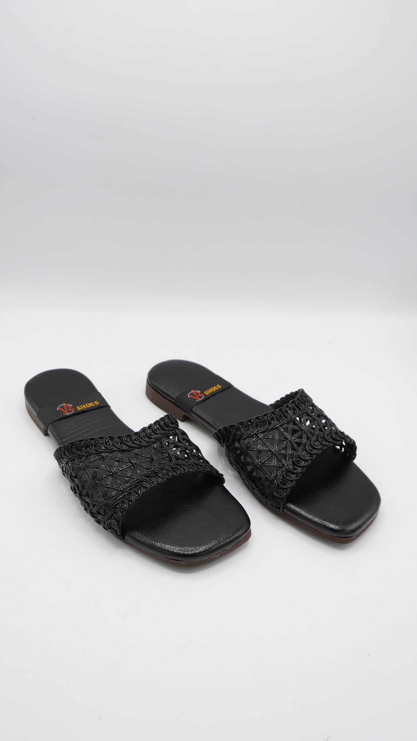 Radiant Black Braided Slides